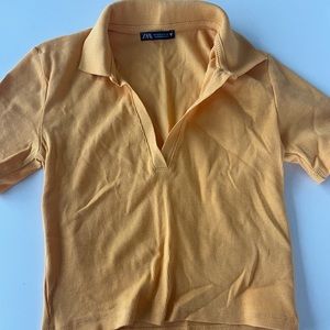 Yellow/orange, polo style crop top from Zara. Size small. Never worn.
